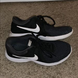Black nike running shoes
